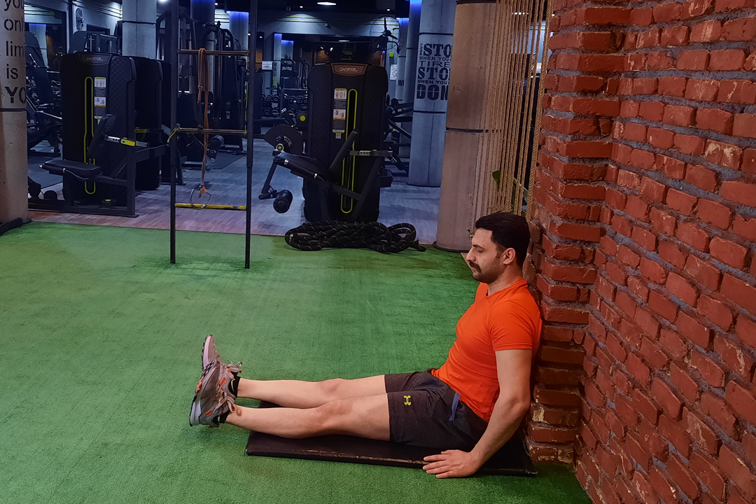 باز کردن زانو ایزومتریک تک نشسته