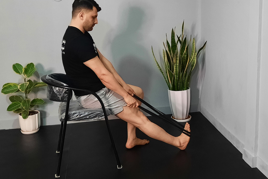 کشش دوقلو با کش صندلی نشسته